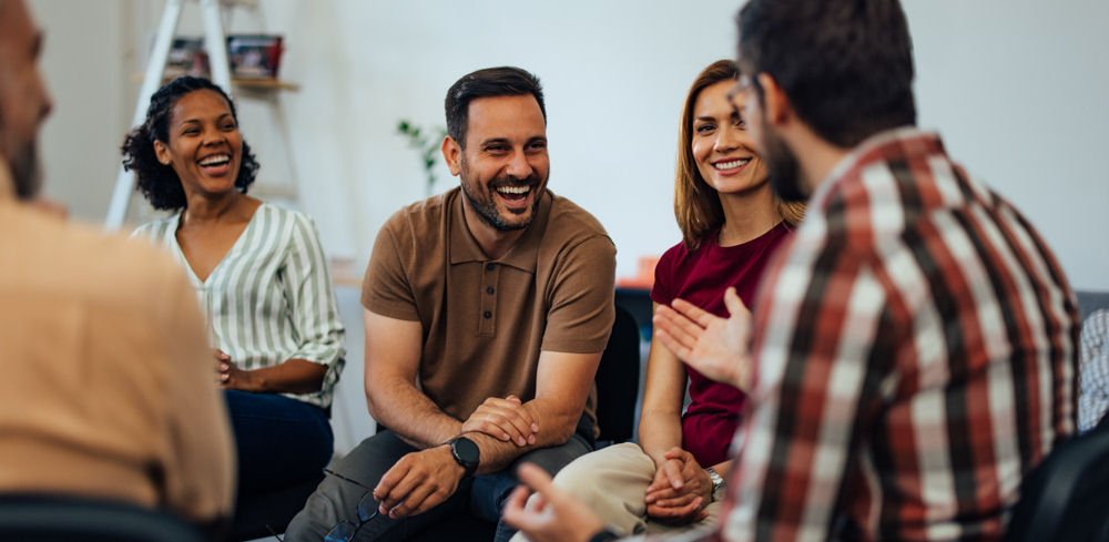 woman speaking to therapist