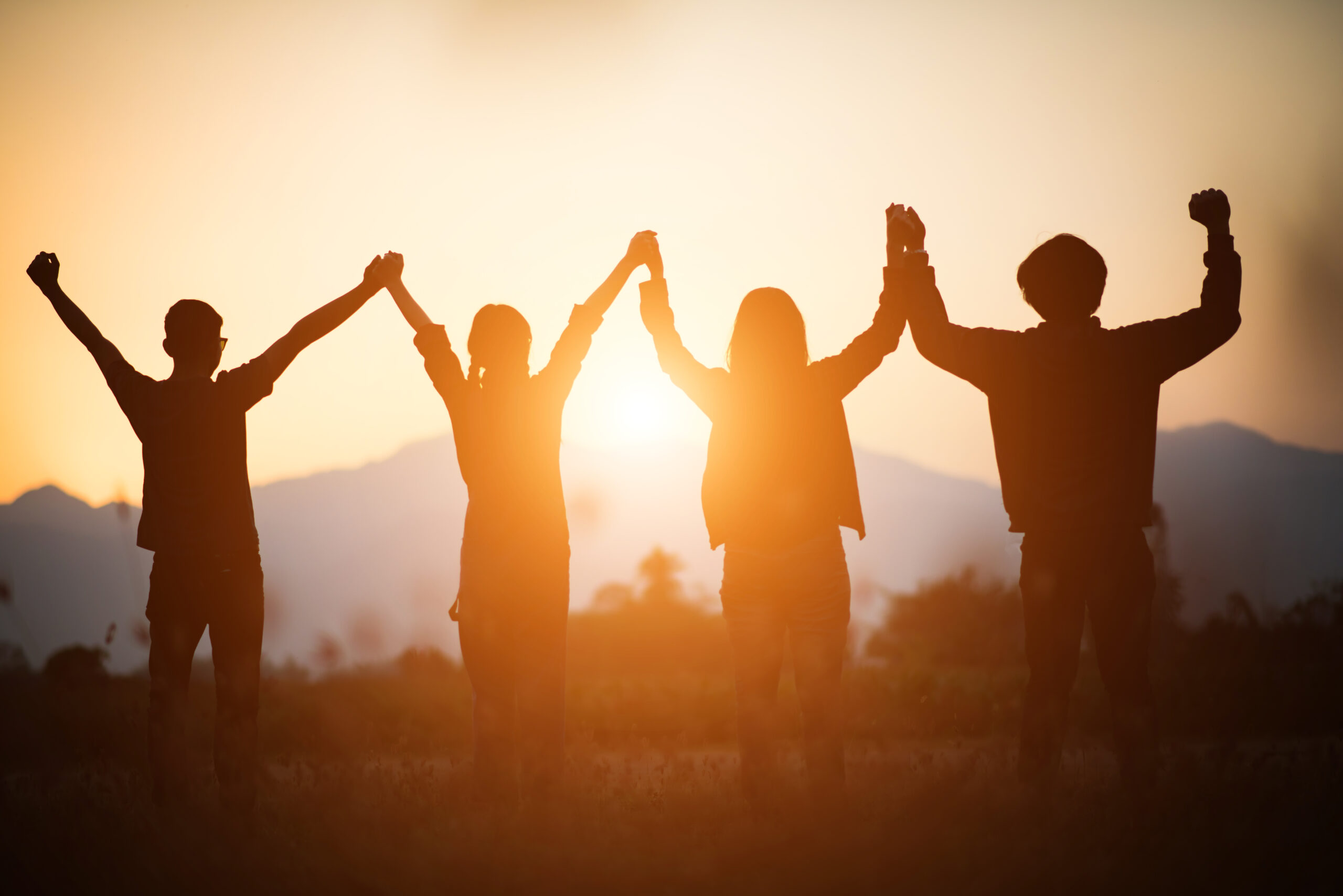 Silhouette of happy business human team making high hands over h medication-assisted treatment in San Diego, medication-assisted treatment, intensive outpatient program