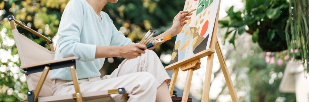 Art therapy session for emotional healing in a peaceful outdoor setting
